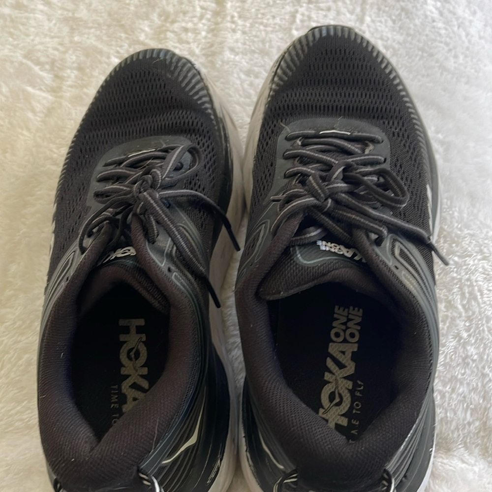Hoka women’s sneakers black with white detail size 7 1/2. Gently used.